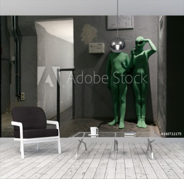 Picture of Two young kids dressed as green aliens
